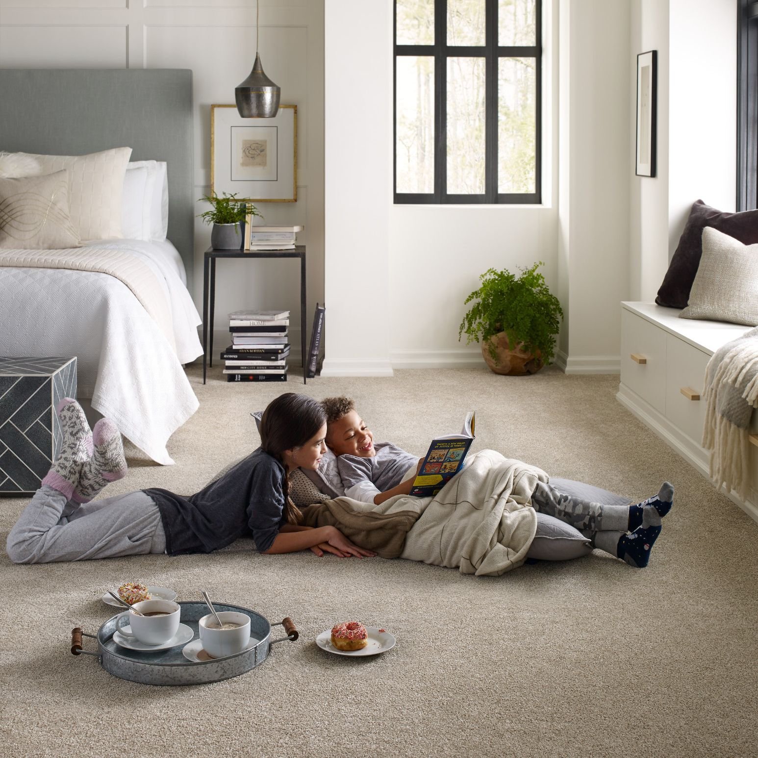 Kids reading on soft carpet for bedroom from Builder's Discount Floor Covering Jacksonville Beach